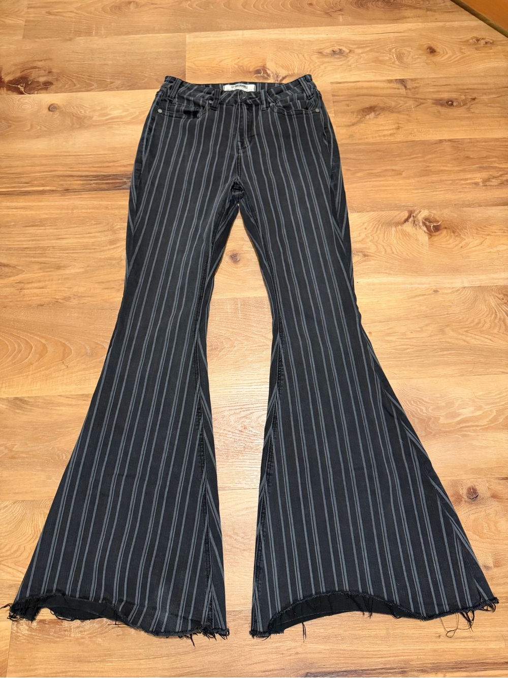 Black Pinstripe Flared Pants with Raw Hem